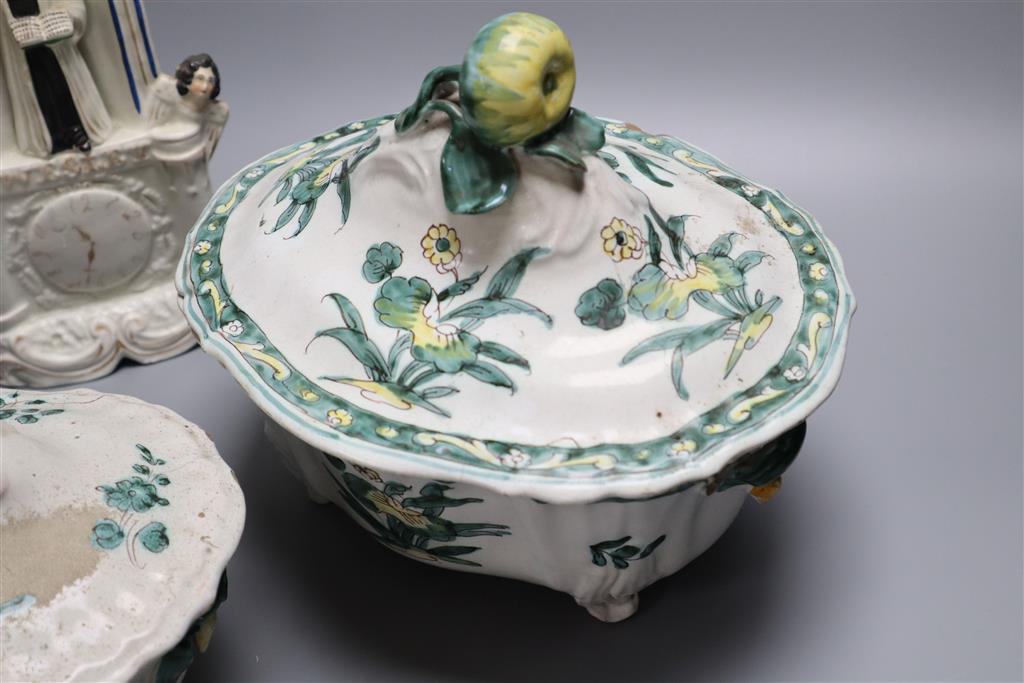 Two 19th century French faience tureens and covers and a Staffordshire pottery group, height 28cm